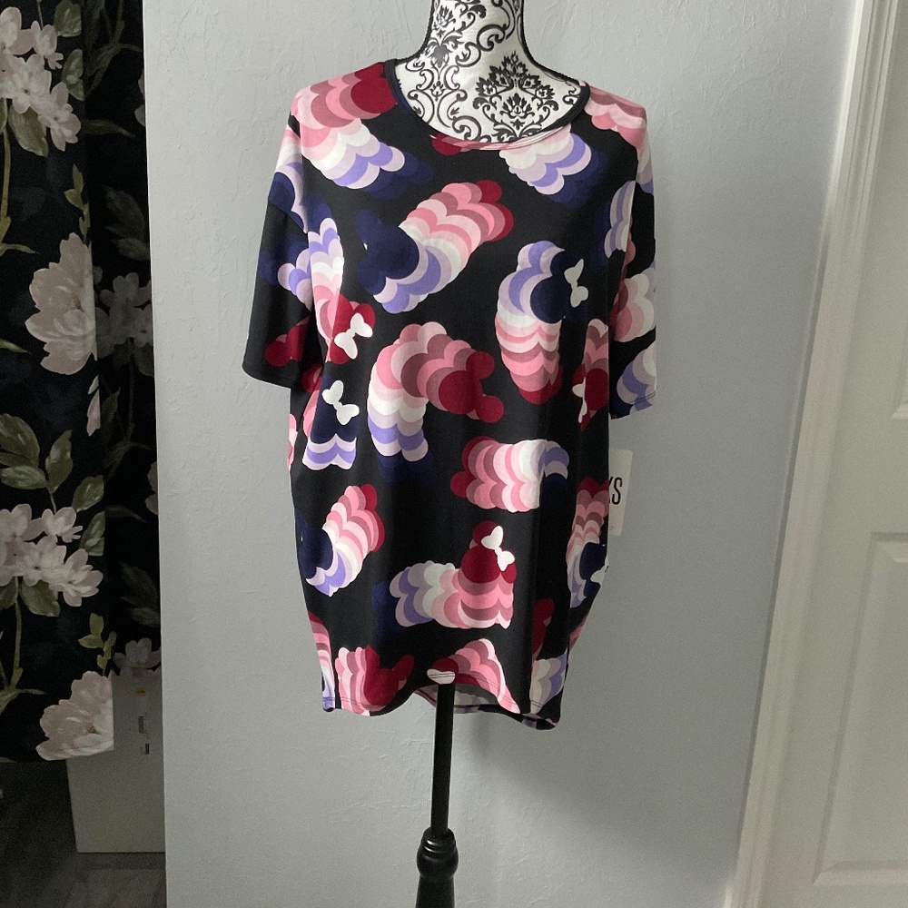 Black shirt with different colored Mini and Mickey  silhouette shapes .